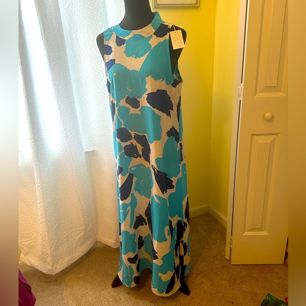 Long dress sleeveless slits on sides beautiful blue color.